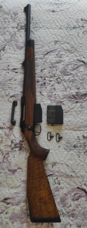 Se vende conjunto formado por un Sauer 202 wild boar 9.3x62 edición jabalí (cañón semi pesado de 51 cm, 02