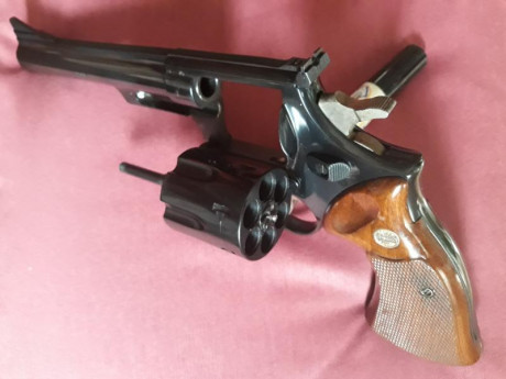 Revolver astra 45 ctg en Libro de Coleccionista en estado de tiro, perfecto estado casi sin uso 1500 euros, 00