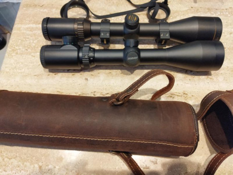 Dos visores uno Silva Magnum y visor zastar de caza retícula a 4 punto rojo en el centro
Funda protectora 11