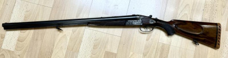 Vendo rifle drilling alemán fabricado por Jos Zeller. Los cañones superiores son en cal.12 y el inferior 01
