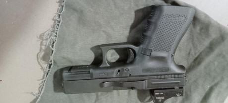 De la Glock soy único propietario pocos disparos con un Burris que la hace divertida también tiene pinza 02