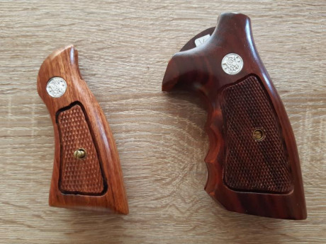 Busco cachas para un S&W K/L-frame de marco cuadrado.

Originales, tipo target. De madera.

Saludos. 30