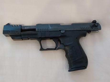 Vendo Walther P22 22lr en buen estado, en su estuche original con los accesorios de desmontaje y regulación. 00