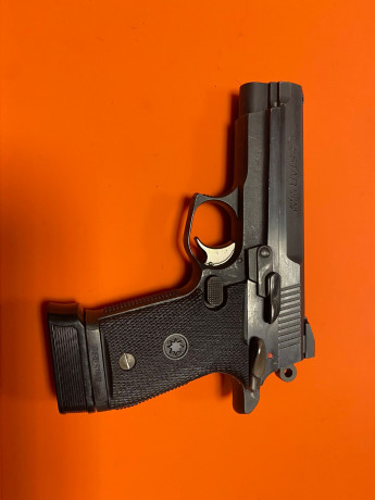 Se vende pistola de la marca Star modelo FIRESTAR M43, en color negro, con caja original y dos cargadores. 02