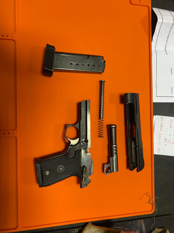 Se vende pistola de la marca Star modelo FIRESTAR M43, en color negro, con caja original y dos cargadores. 01