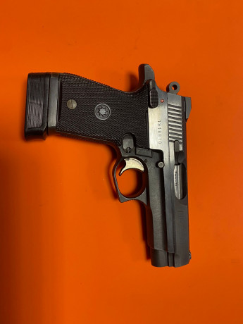 Se vende pistola de la marca Star modelo FIRESTAR M43, en color negro, con caja original y dos cargadores. 00