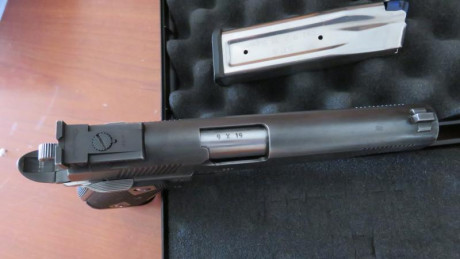 Por obligación vendo mi preciosa HPS/STI 2011 en calibre 9mm a tirado con munición recargada para precisión, 12