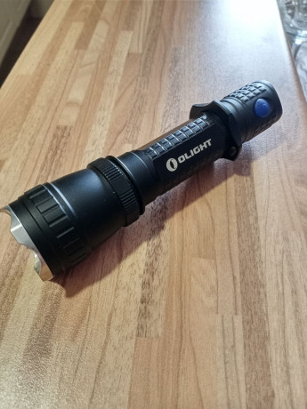 Vendo Linterna táctica Olight M20SX Javelot, linterna de construcción blindada y alta dureza, incorpora 12