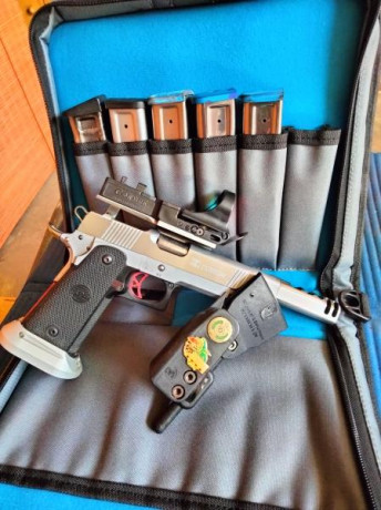 Calibre 38 super, funda de regalo y una empuñadura nueva y algunos recambios, funciona perfectamente y 02