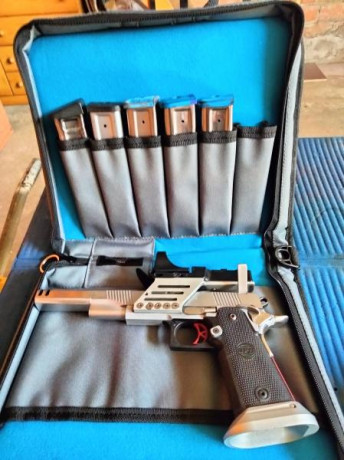 Calibre 38 super, funda de regalo y una empuñadura nueva y algunos recambios, funciona perfectamente y 01