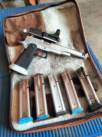 Calibre 38 super, funda de regalo y una empuñadura nueva y algunos recambios, funciona perfectamente y 00