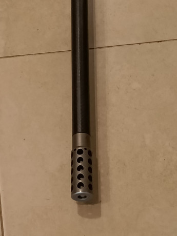 Vendo rifle Voere ,  cañon recubierto de carbono, freno de boca de titaneo, calibre 7mm rem mag, con visor 11