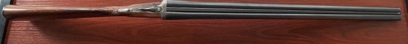 Escopeta paralela Garbi calibre 12 con 2 gatillos y expulsora. Tiene marcas de uso pero funciona a la 00