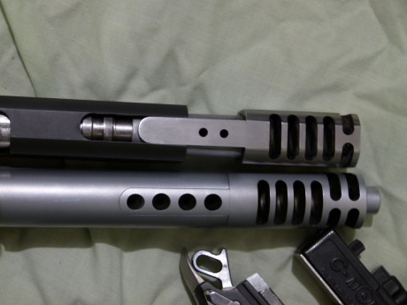 La vendo por no usarla. Sólo la usé con el kit del 9 y poco.
Un cargador de 20 balas para el .38 ó 9mm. 71