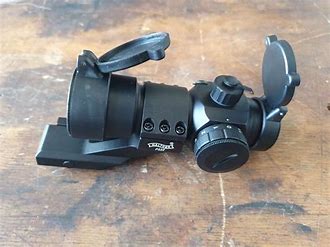MIRA OPTICA/PUNTO ROJO/Walther PS22
 pasos de Brillo Ajustable
Lentes recubiertas para mejorar la claridad
Montaje 02