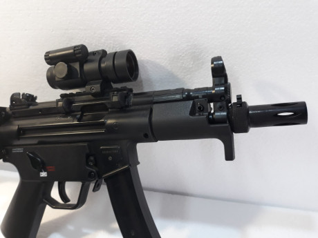 Vendo H&K MP5 BB's 4.5. La ultima de micoleccion de CO2, como nueva y COMO en las fotos, prácticamento 21