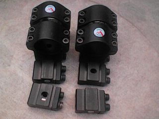 Vendo dos pares de anillas para carril de 11m/ms. alturas medias y 1" diametro de tubo del visor.Sportsmatch 00
