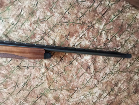 Benelli Premiun Superligera 12/76 con banda, caño de 66cm, esta perfecta poco uso y bien cuidada, con 00