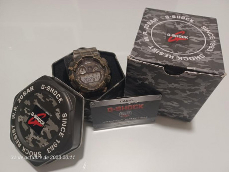 Reloj Casio G-Shock, color camo, muy poco uso, prácticamente nuevo, con caja original metálica, libro 11