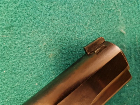 Norinco A 1 del 45 ACP , mejorada.

Alza Wilson Combat y punto de mira, super ajustada.

Muy precisa.

El 02