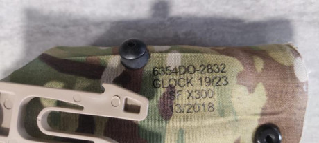 Vendo por 97 euros esta funda Safariland multicam para Glock 19 con linterna Surefire X300 ,X200 y TLR-1. 00