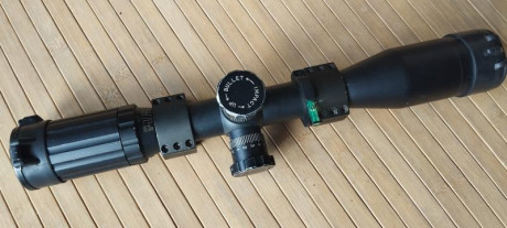 Visor   SWFA  20x40  mil dot.

Muy  difícil de importar por la restricciones  de exportación  en USA
 01