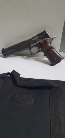 Pongo en venta este arma en excelentes condiciones 9 mm 6 pulgadas es un compañero del club que deja la 00