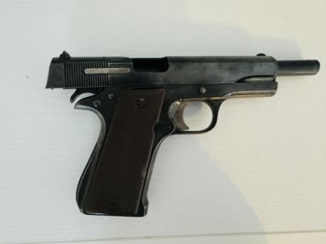 Vendo pistola 9mm con poco uso pistola de uso reglamentario la vendo por no usar para más información 00