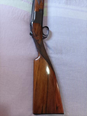 Se vende superpuesta Browning B25 game gun calibre 12, cañones de 70cm tres y una estrella,selector de 02