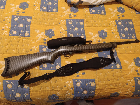 Vendo Carabina Ruger con hidroimpresion, no  es de c-argadores, las balas se meten, en un tubo debajo 02