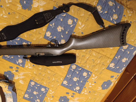 Vendo Carabina Ruger con hidroimpresion, no  es de c-argadores, las balas se meten, en un tubo debajo 01