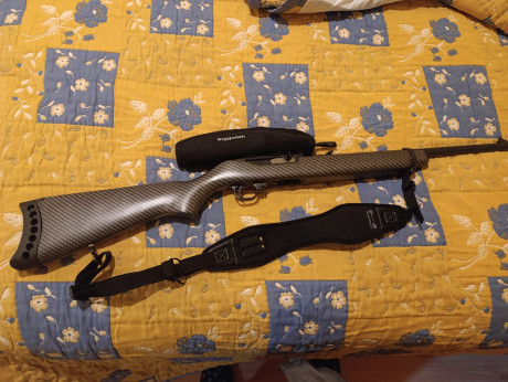 Vendo Carabina Ruger con hidroimpresion, no  es de c-argadores, las balas se meten, en un tubo debajo 00