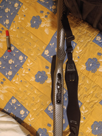 Vendo Carabina Ruger con hidroimpresion, no  es de c-argadores, las balas se meten, en un tubo debajo 42