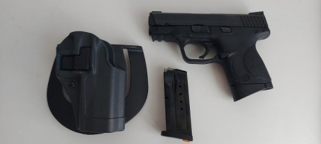 Se vende como se ve en las fotos..con miras de tritium y 2 cargadores uno de 10 y otro de 12..también 02