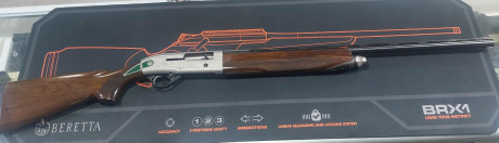 Un amigo vende está escopeta Beretta 
Lágrima verde accesorios y maleta 01