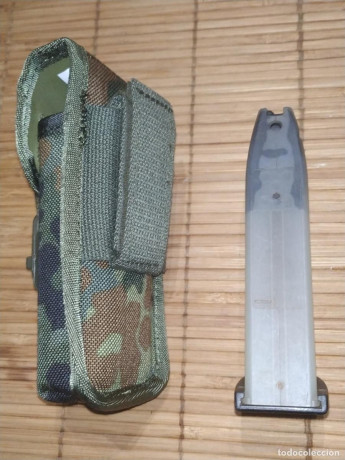 Se vende cargador HK USP  Standard.
Capacidad para 15 cartuchos 9mm Parabellum, con su funda porta cargador.
Construido 02