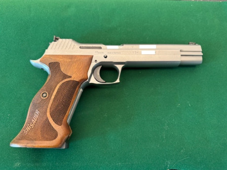 Buenas tardes a todos, vendo mi Sig Sauer P210 plata supertarge por no usar, me da pena que este en armero, 02