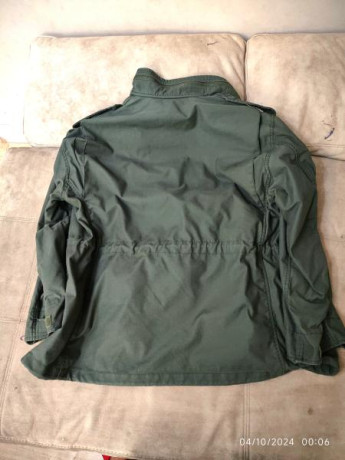 Muy poco uso, como nueva. Color verde OD. Cremalleras y botones en perfecto estado. También compré el 00