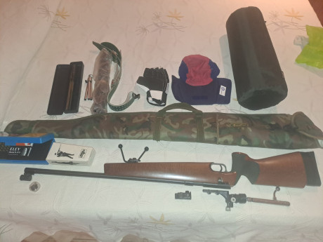 Un compañero vende un carabina Anschuzt 1403 que es idéntica a la mach64 , pero se ve que es anterior. 00