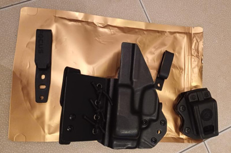Buenas amigos.

Vendo funda IWB de Glock 43x y portacargador.

Funda para llevar entre a la posición  00