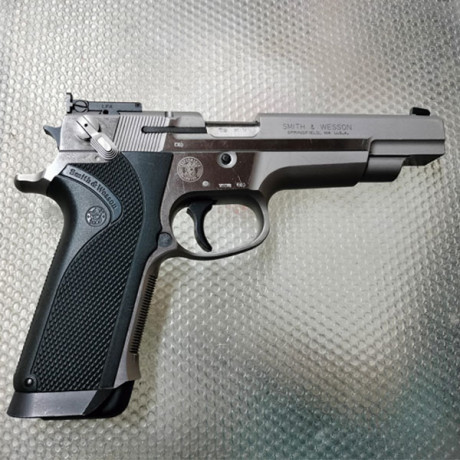 Busco pistola de 9mm S&W target champion o PPC. 22