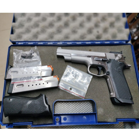 Busco pistola de 9mm S&W target champion o PPC. 20