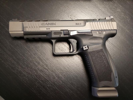 Vendo pistola canik 9 mm, está nueva, tiene poco uso, solo he gastado una caja de balas. El alza es regulable. 01