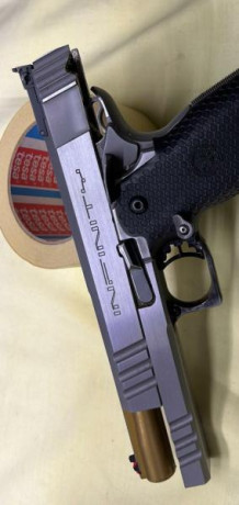 Vendo pistola Infinity calibre 45 impecable incluido tres cargadores.vaimas y dies incluidos en el precio 60
