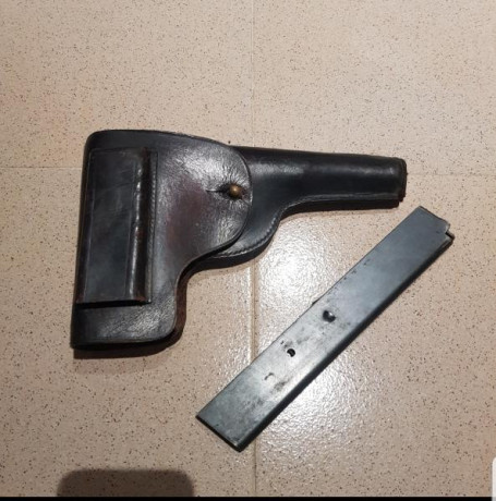Cargador de 15 tiros y funda  , el conjunto 350 euros más envío,  Madrid 01