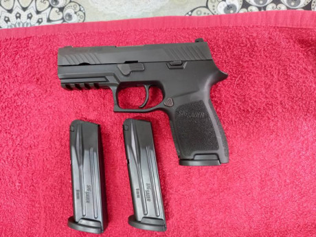 Vendo Pistola Sig-Sauer modelo P320 Compact calibre 9mmP guiada con Licencia A, también se puede guiar 01