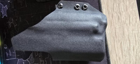 Funda IWB de la marca AMG para portar una H&k p2000sk con linterna olight valkyrie pl mini 2 
precio 00