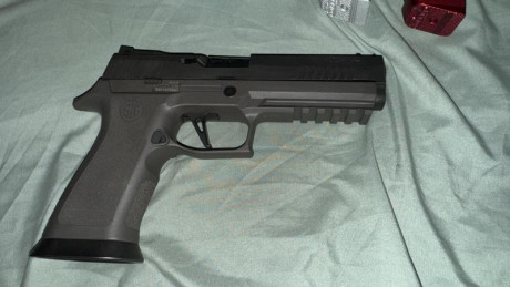 Vendo SIG P320 X-FIVE Legión se encuentra en Cádiz guiada en F sobre 5000 disparos efectuados van con 01