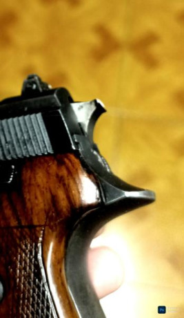 Vendo pistola Astra A-80 calibre 9x19   con 10 cargadores y cachas de madera   los cargadores se pueden 01