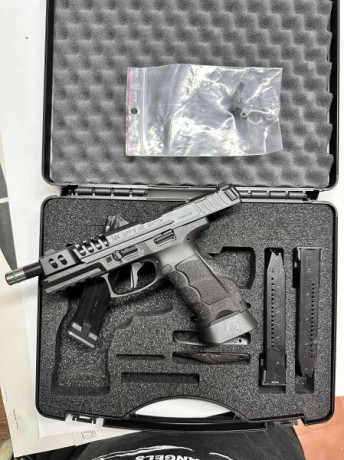 Se vende Hk sfp9 OR en caja original, como nuevo. Solo tiene 300 disparos. Viene con el gatillo cambiado 02